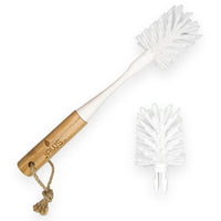 A bamboo and white plastic bottle cleaning brush with a hanging rope, shown alongside a second brush head on a white background. The brand name 'Jaws' is engraved on the bamboo handle.