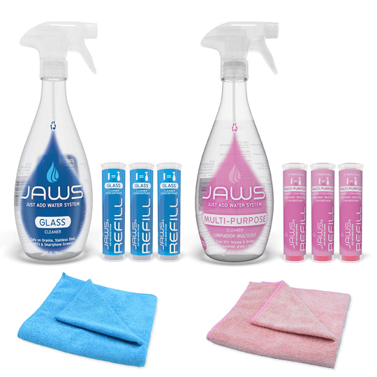 Cleaning products including glass cleaner, multi-purpose cleaner, 3 refill pods of each, and micro-fiber cloths on a white background