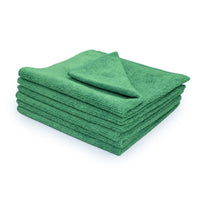 Stack of 6 green microfiber towels on a white background.