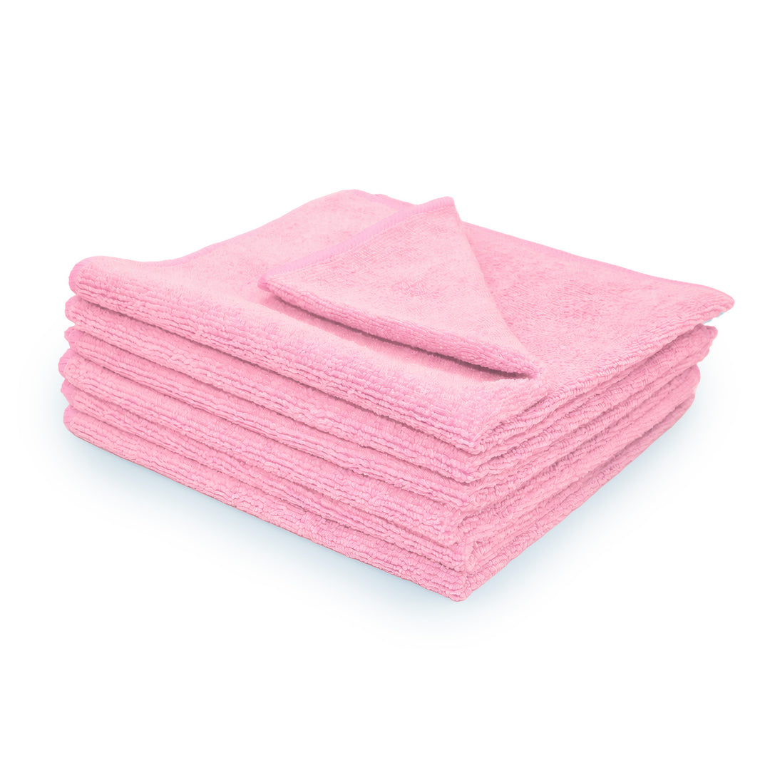 Stack of 6 pink microfiber towels on a white background.