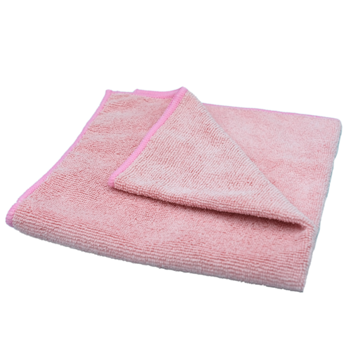 Pink microfiber towel a white background