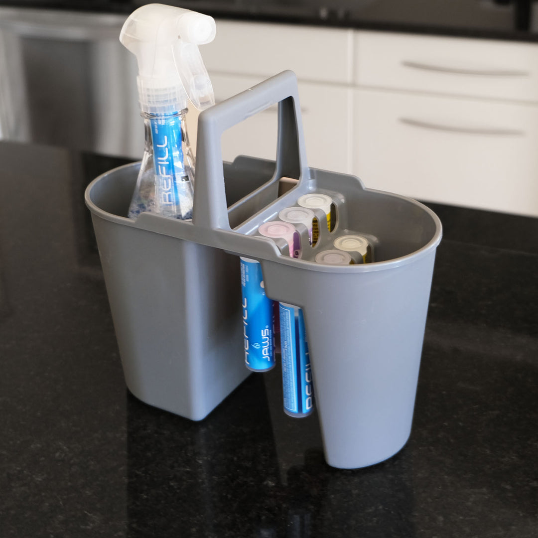 Removable tote from JAWS Caddy.  Containing spray bottle and Refill pods.